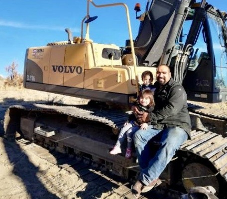 Image of a member of Tony Beets’ crew in Gold Rush, Juan Ibarra and his kids