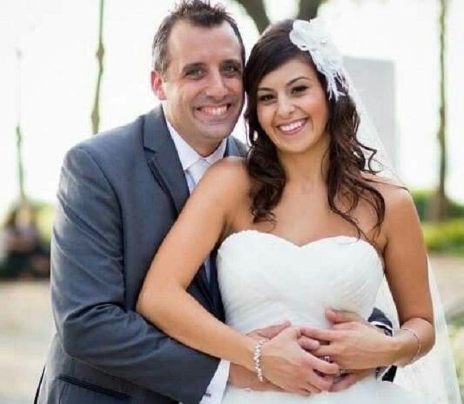 Joe Gatto with his wife in their wedding