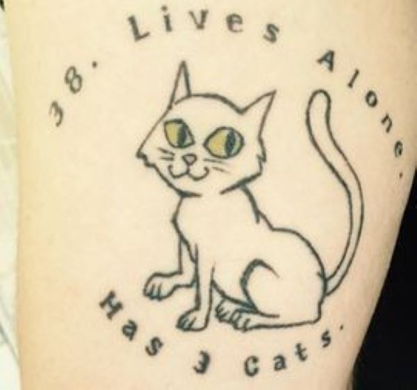 Brian Quinn's cat tattoo