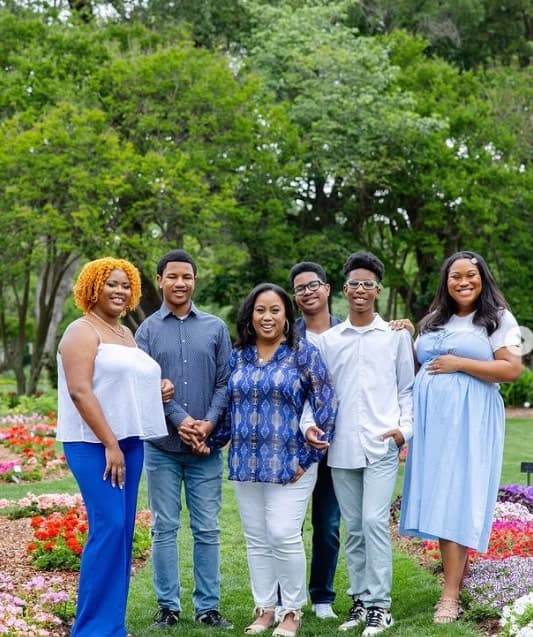 Image of Chrystal Evans Hurst with her husband, Jessie Hurst, and their kids