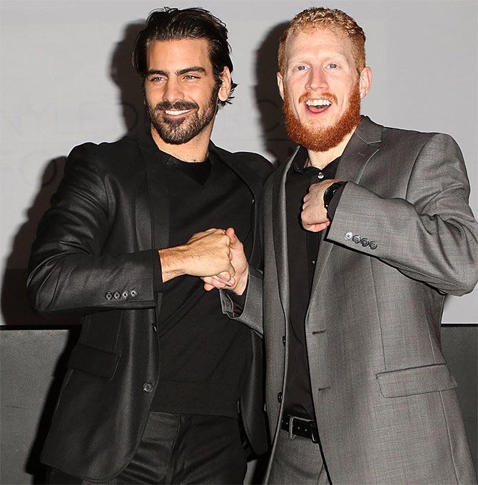 Image of Nyle DiMarco with his twin brother, Nico DiMarco