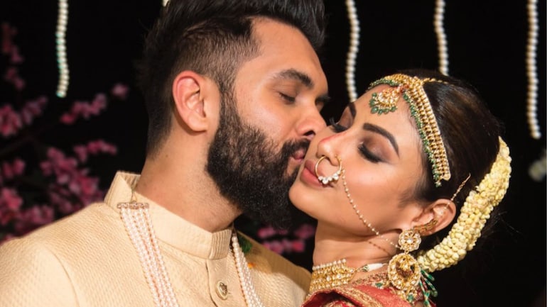 Image of Suraj Nambiar with her husband, Mouni Roy