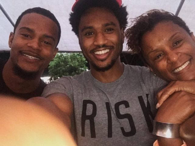 Image of Trey Songz with his mother and brother