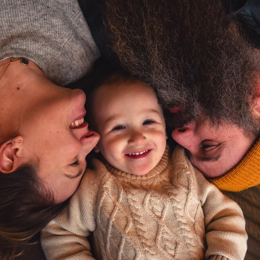 Image of Katie Raney with her husband Matt Raney and kid