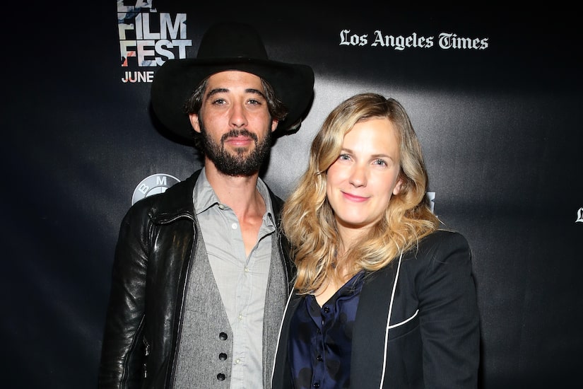 Image of Ryan Bingham with his wife Anna Axster